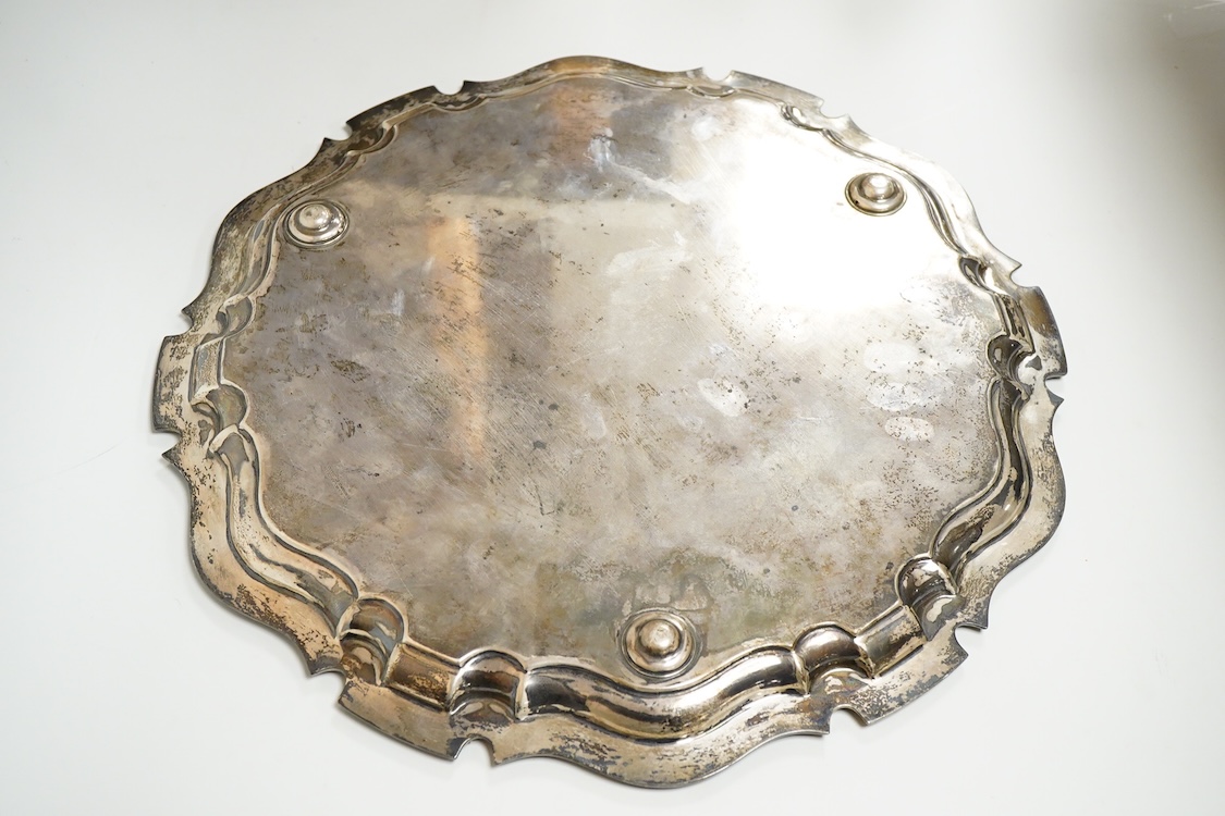 A George V silver circular salver with pie crust border and engraved armorial, by Alexander Clark Co. Ltd, Sheffield, 1922, 39.8cm, 49oz.